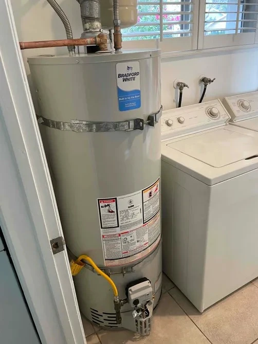 residential-water-heater-maintenance-laundry-room.webp